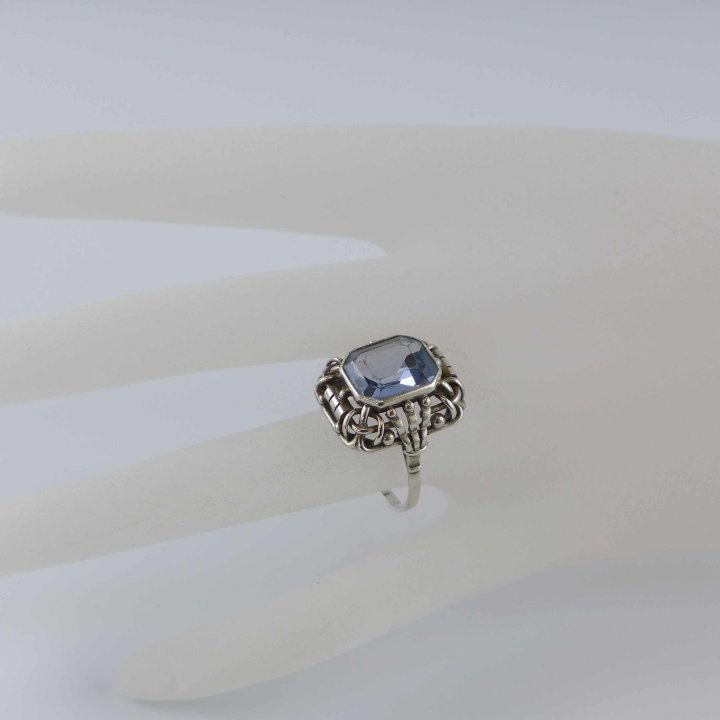 Silver ring with synthetic light blue spinel