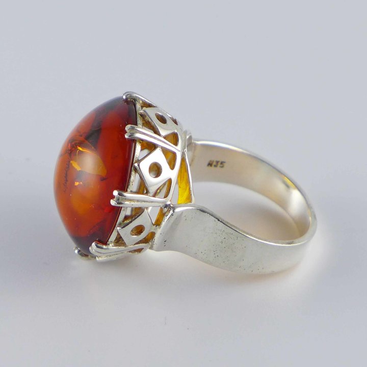 Ring with large amber cabochon