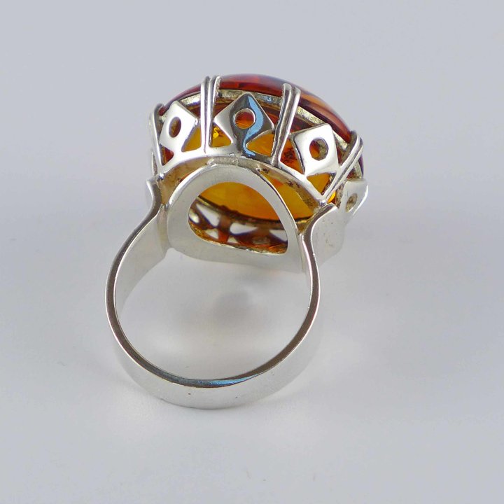 Ring with large amber cabochon