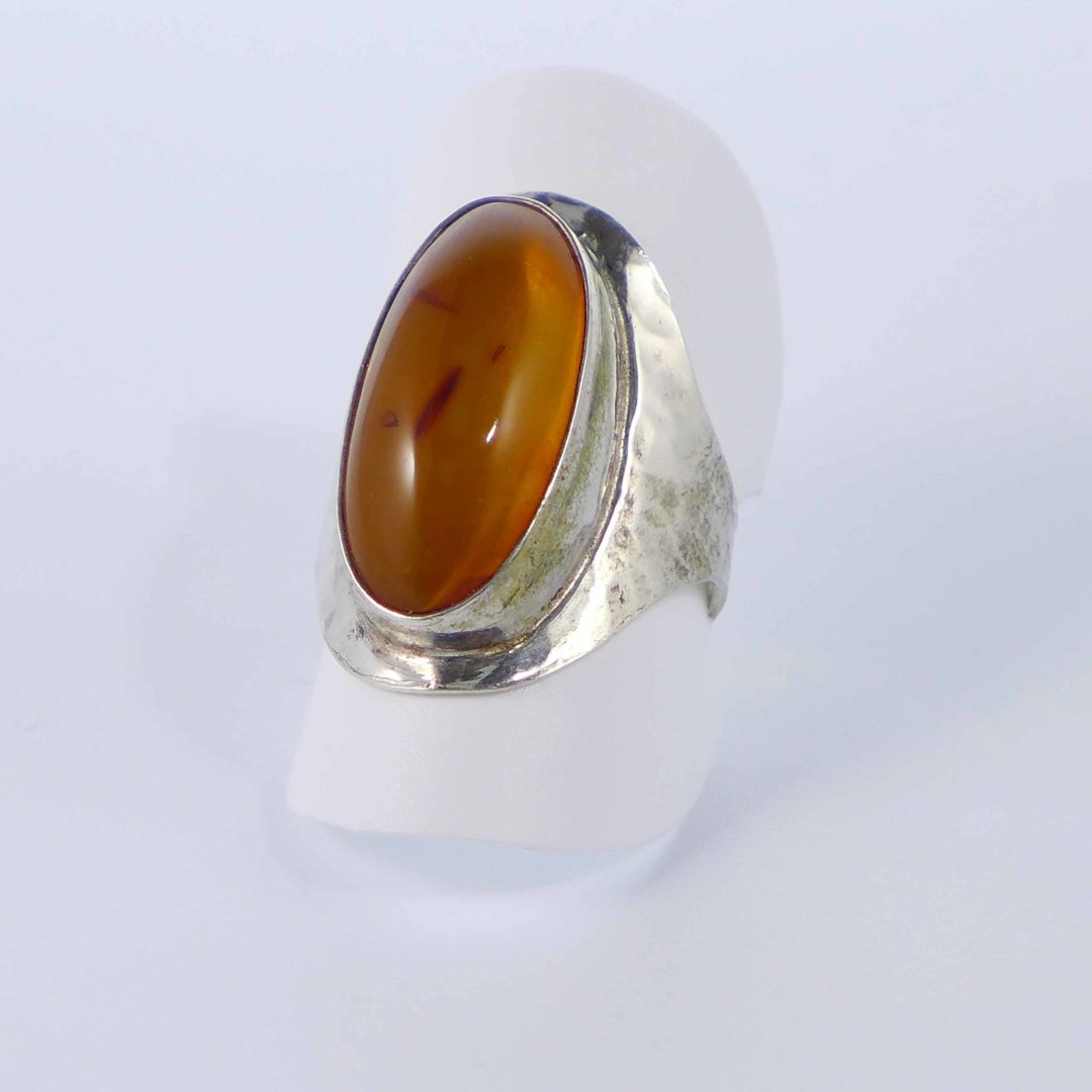 Hammered silver ring with amber