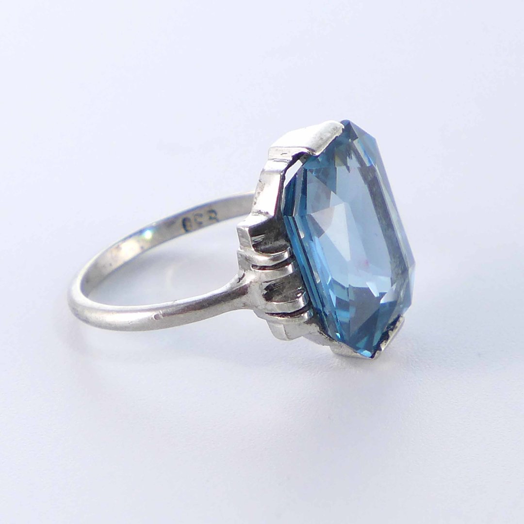 Technical silver ring with light blue crystal glass