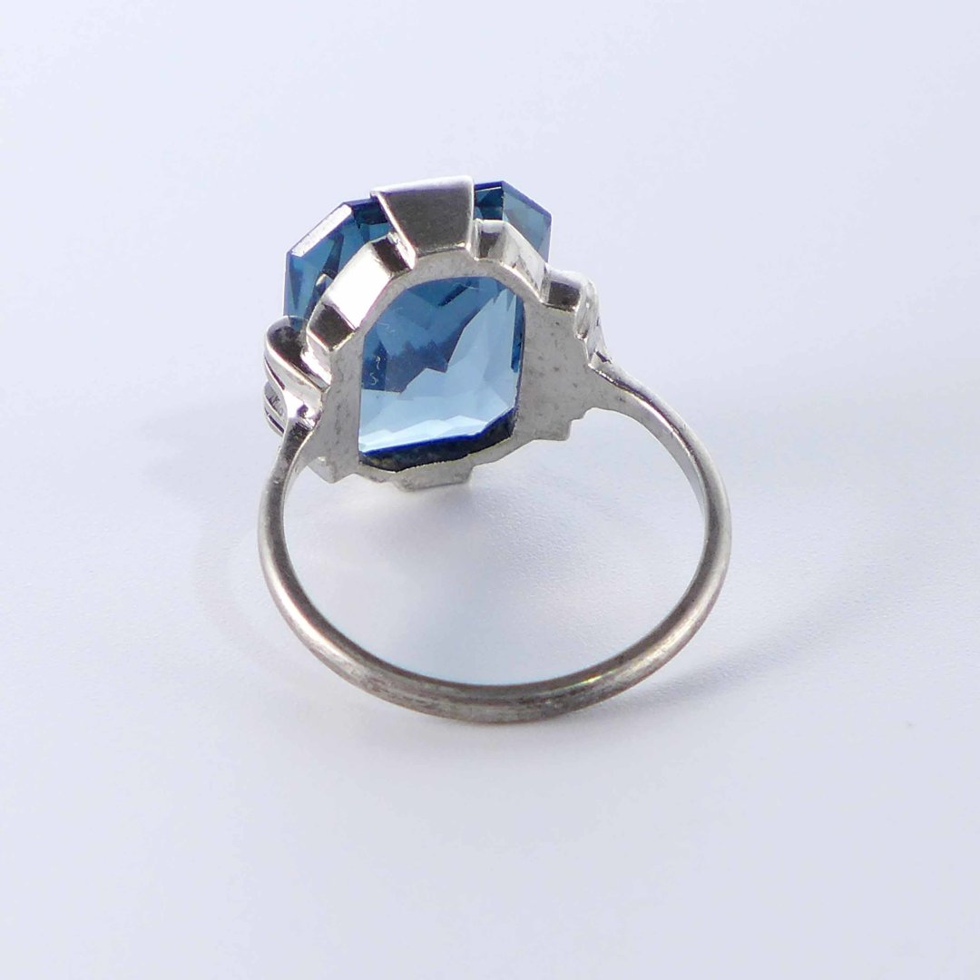 Technical silver ring with light blue crystal glass