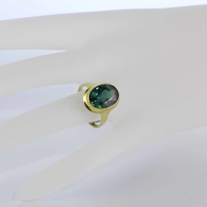 Gold plated ring with tourmaline stone