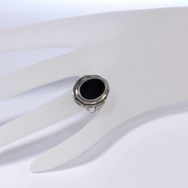 Oval silver ring with onyx