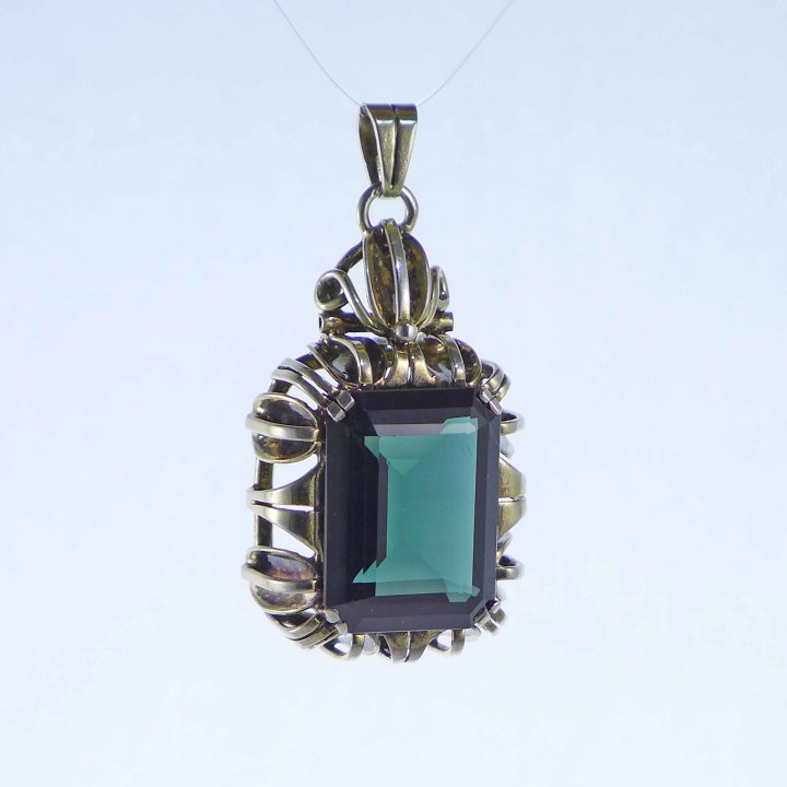 Gold plated pendant with bottle green stone