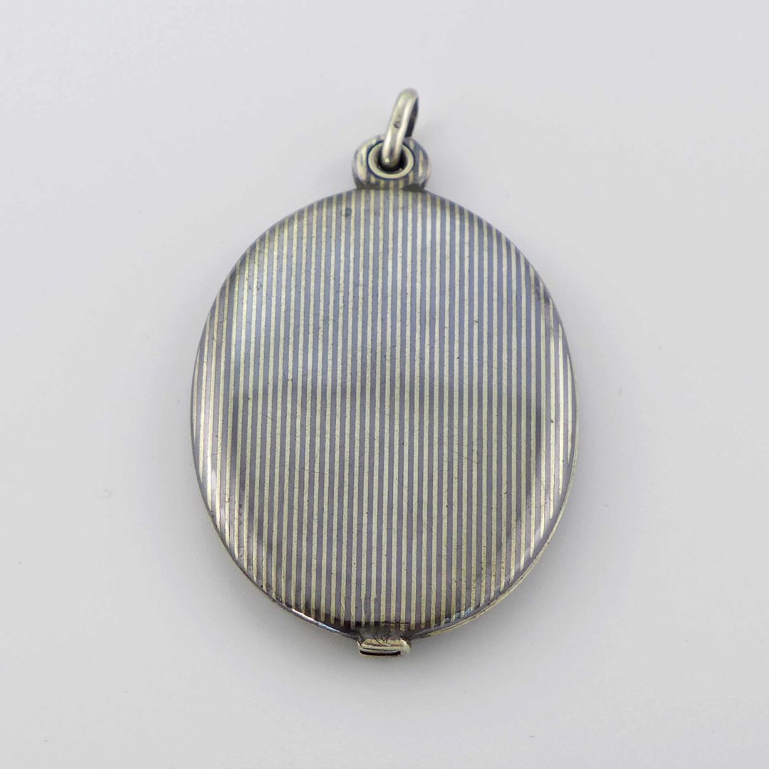 Niello pendant with mirror