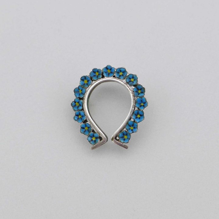 Horseshoe brooch with enameled forget-me-nots