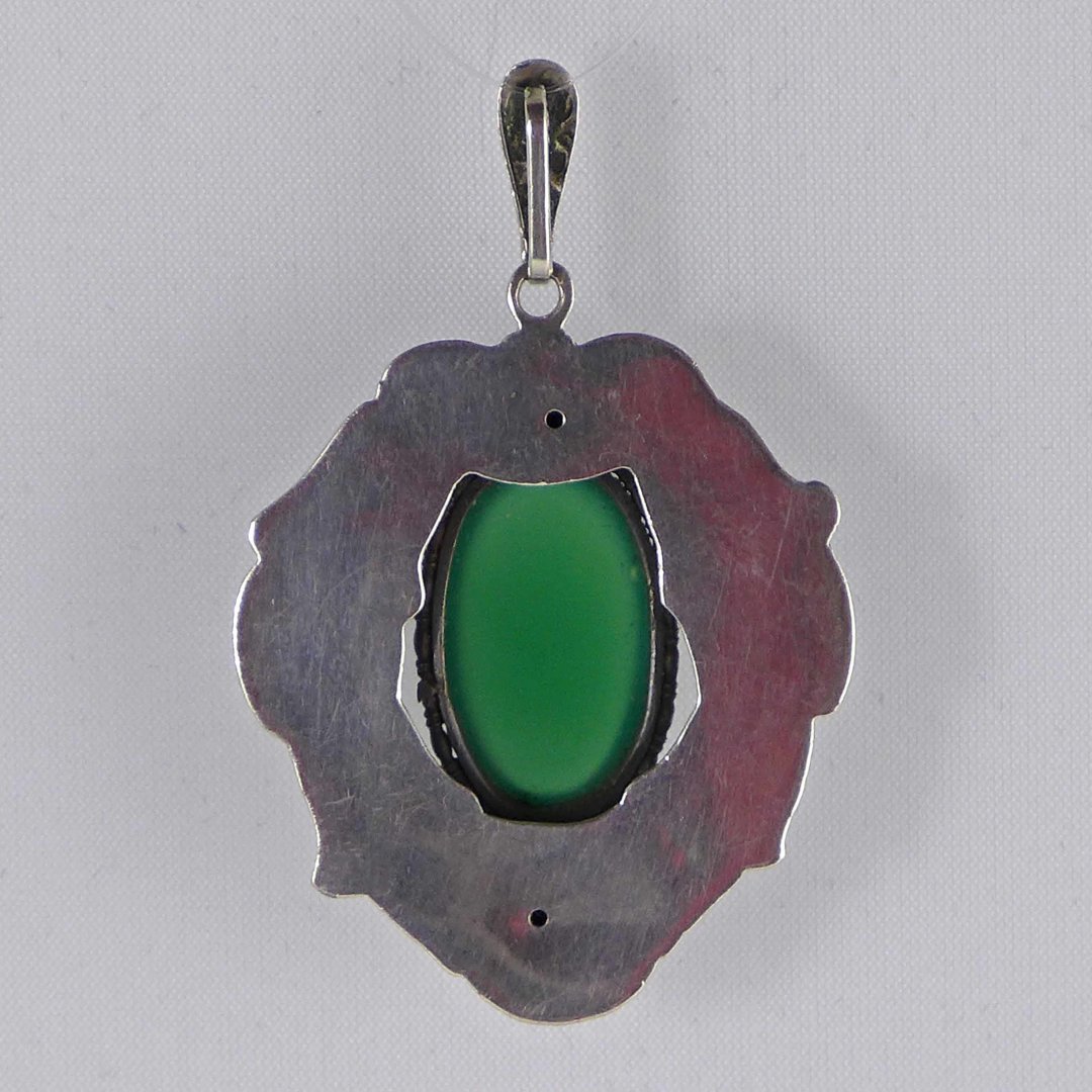 Driven art nouveau pendant with green agate
