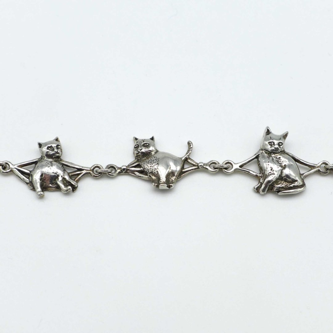 Silver bracelet with cats