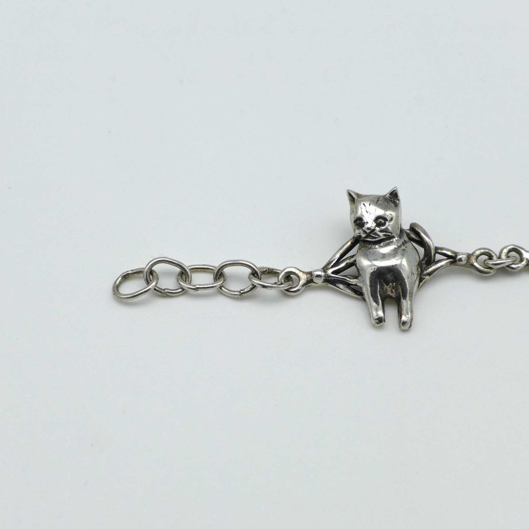 Silver bracelet with cats