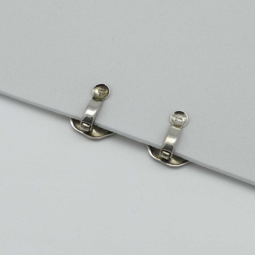 Silver earclips with enamel pansies