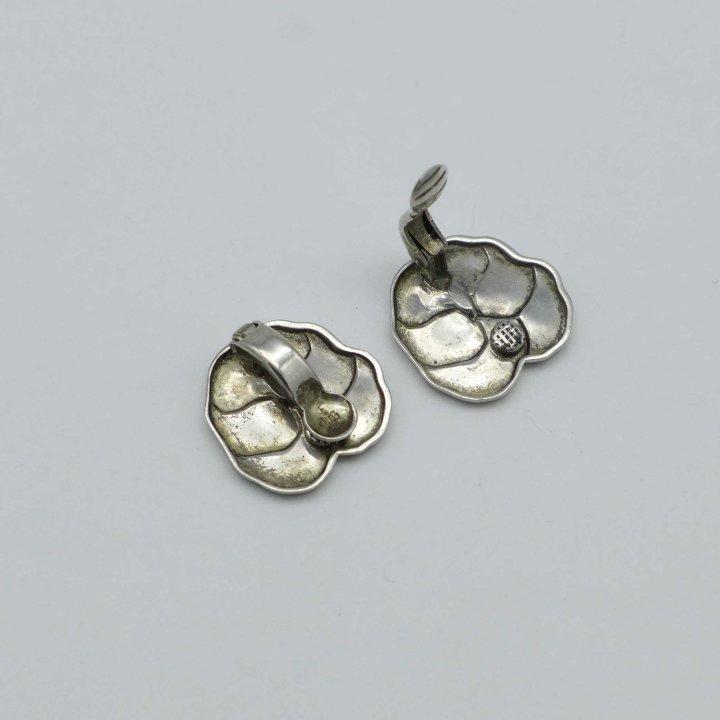 Silver earclips with enamel pansies