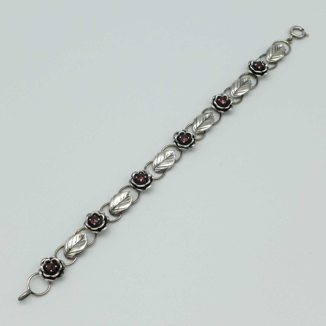 Silver bracelet with roses and pomegranates