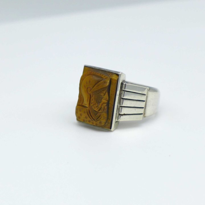 Silver ring with knight head in tigers eye