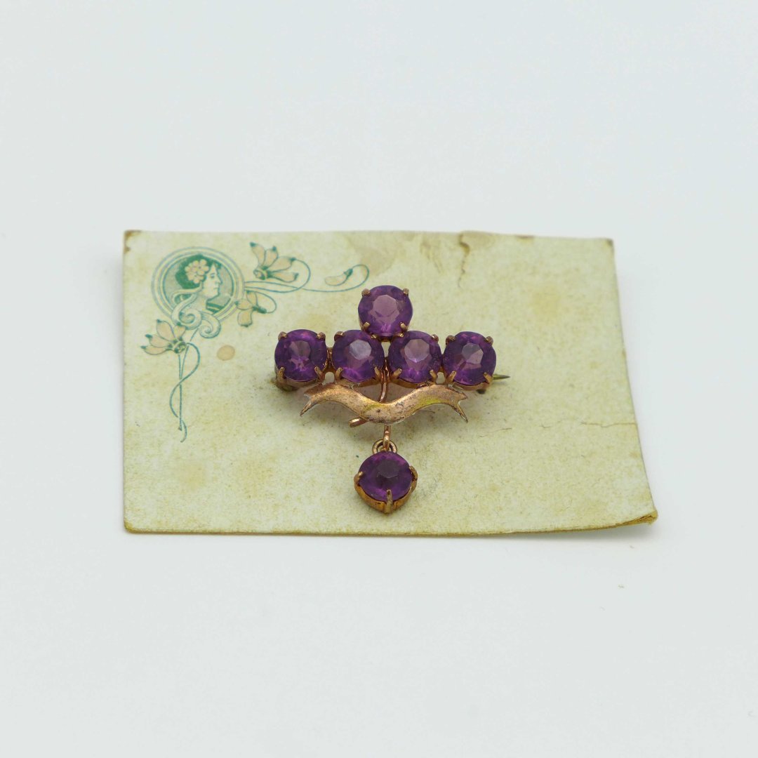Art Nouveau brooch with purple rhinestones