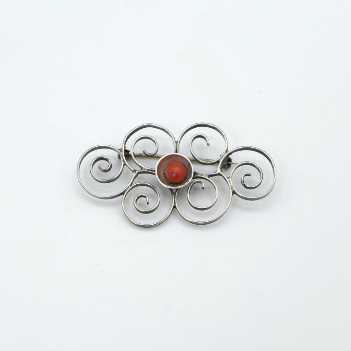 Dainty silver brooch with coral
