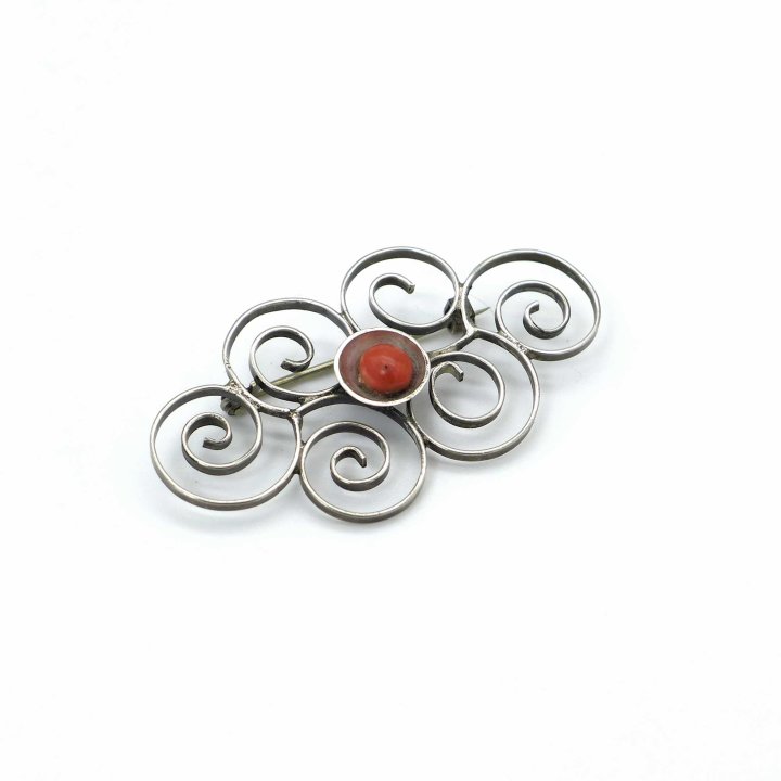 Dainty silver brooch with coral