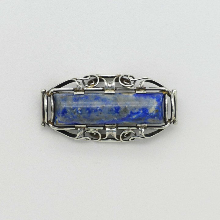 Silver brooch with lapis lazuli