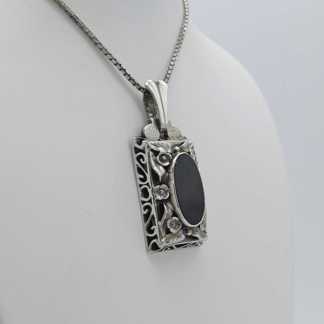 Handcrafted silver pendant with onyx