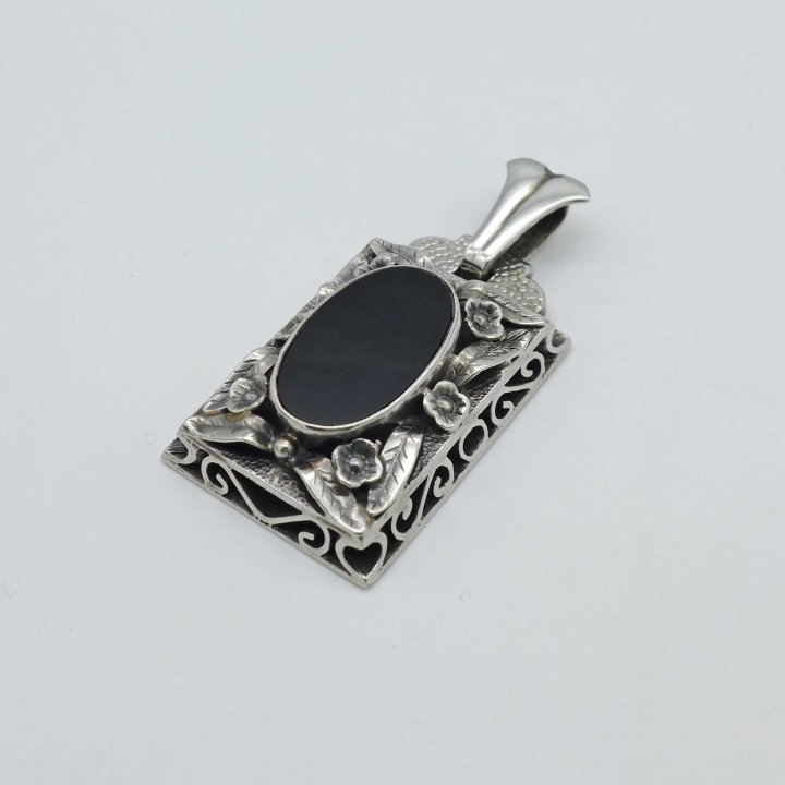 Handcrafted silver pendant with onyx