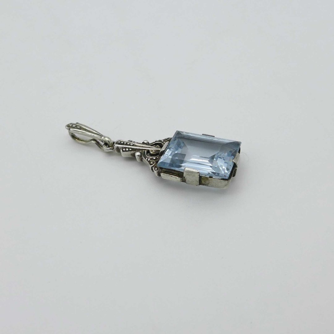 Art Deco pendant with light blue stone
