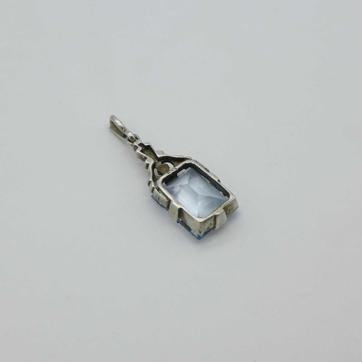 Art Deco pendant with light blue stone