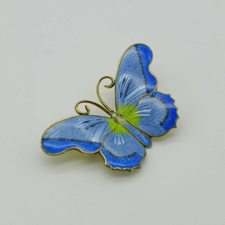 Light blue enamel butterfly brooch