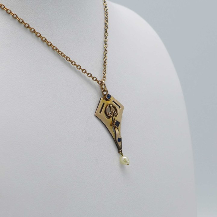 Art Nouveau pendant in gold doublé with freshwater pearl