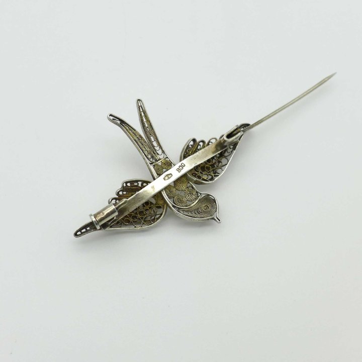 Silver filigree brooch swallow
