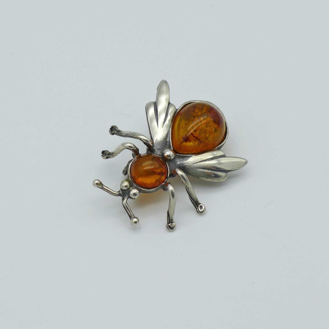 Bee brooch-pendant with amber