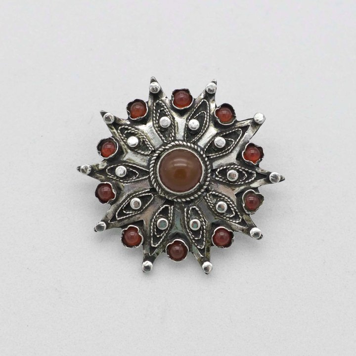 Brooch Pendant in star shape with carnelian