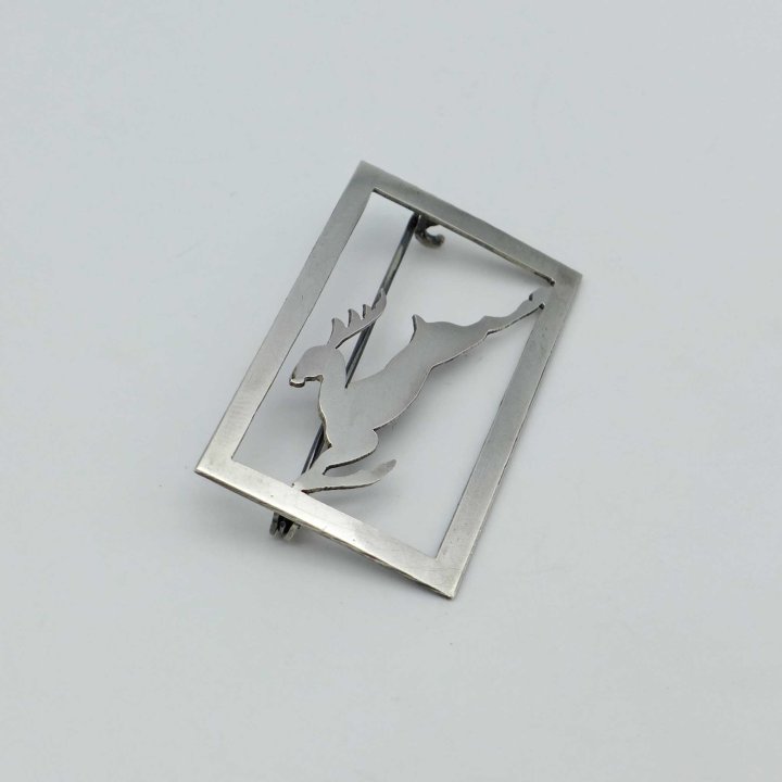 Sawn silver brooch with stag