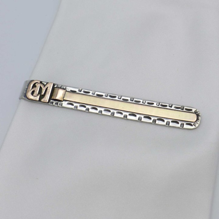 Silver tie clip with monogram EM