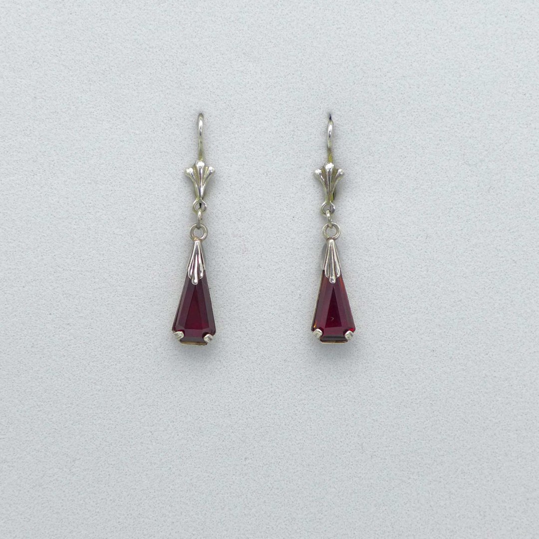Silver earrings with red dangles