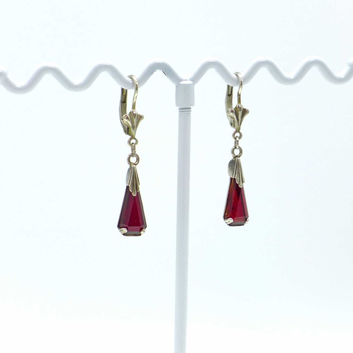 Silver earrings with red dangles