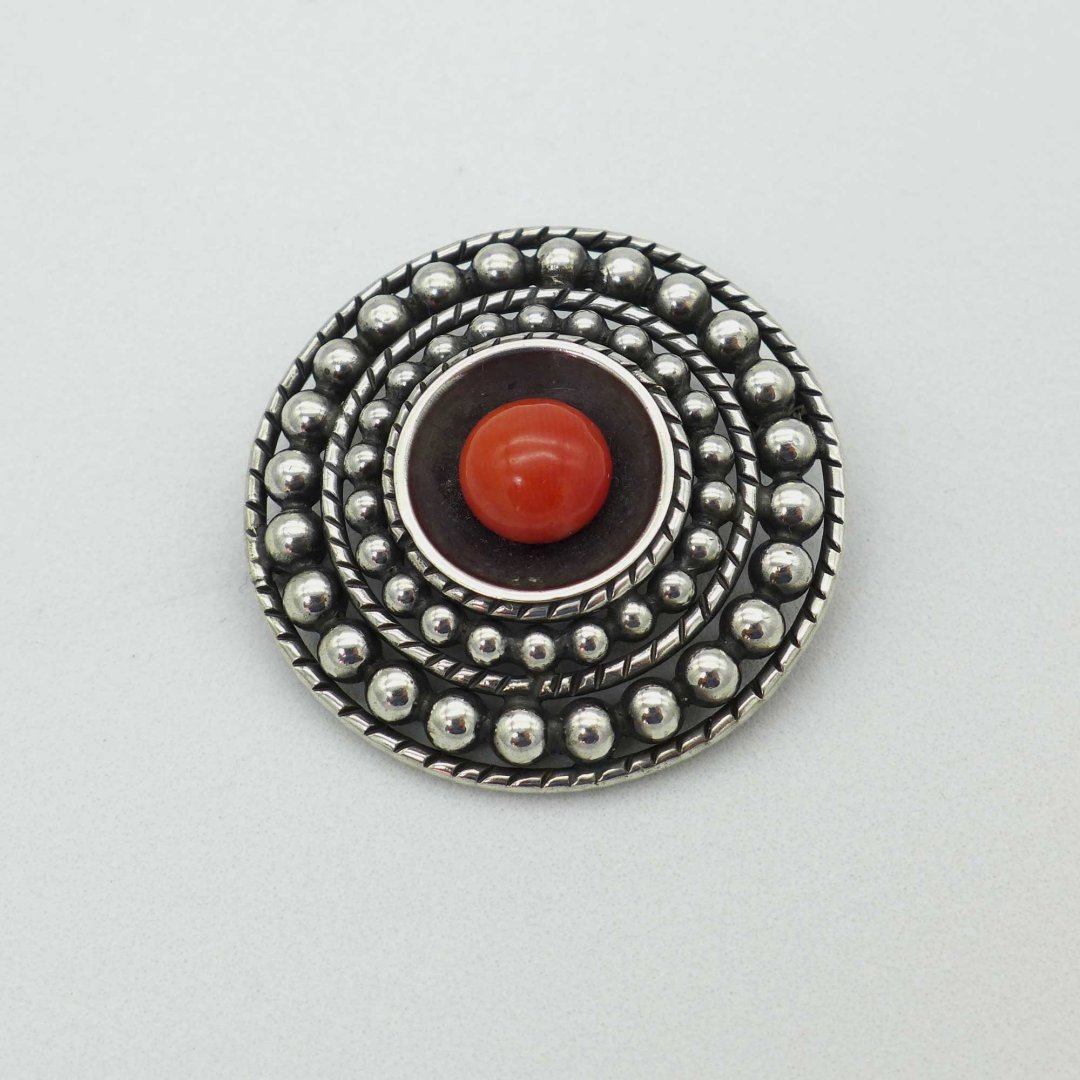 Round coral brooch from the 1920s