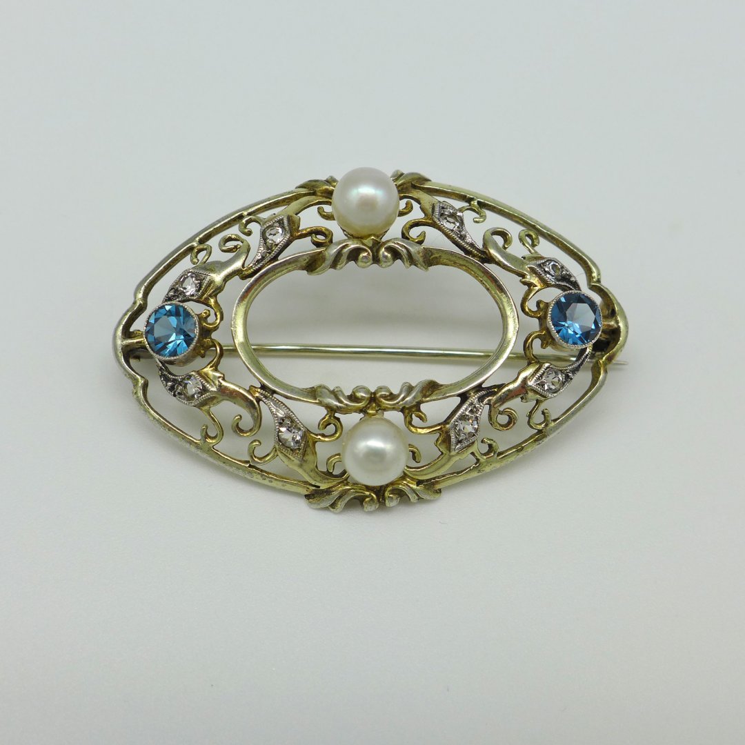 Ovale Brosche mit Perlen und Strass
