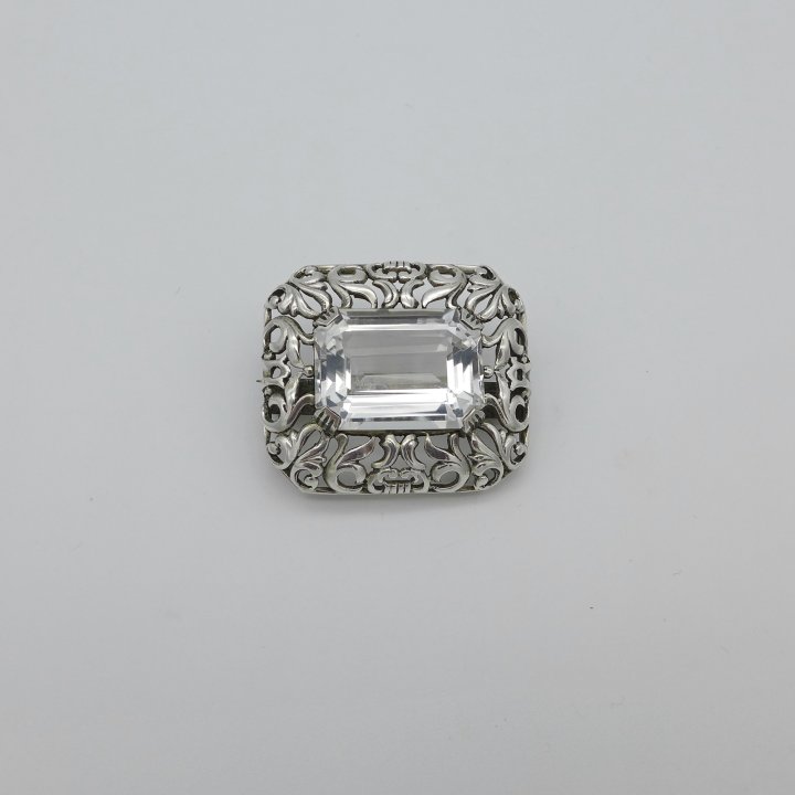 Silver brooch with large rock crystal