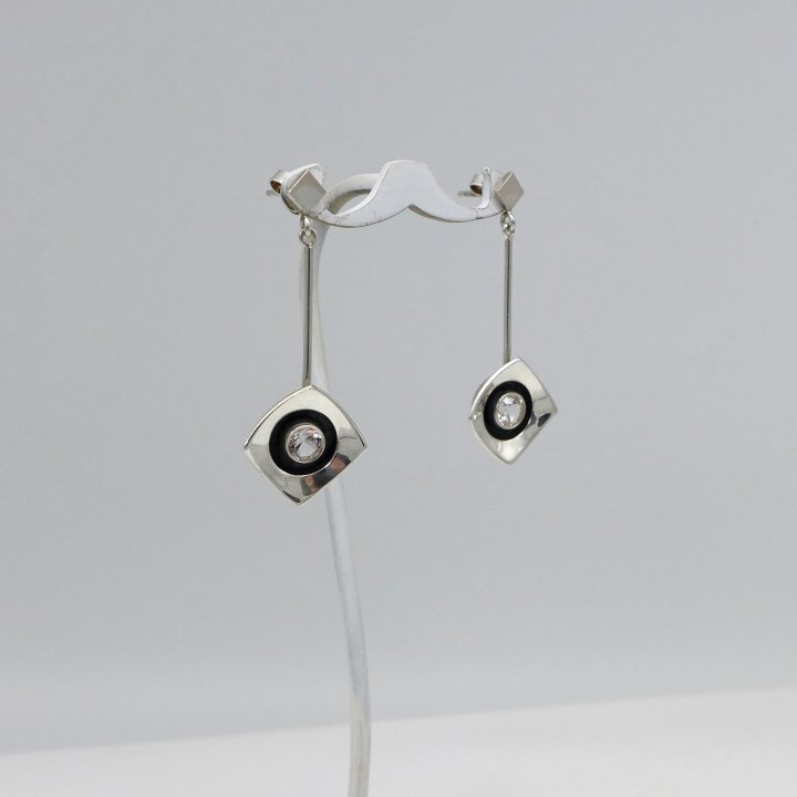 Long stud earrings with rock crystal