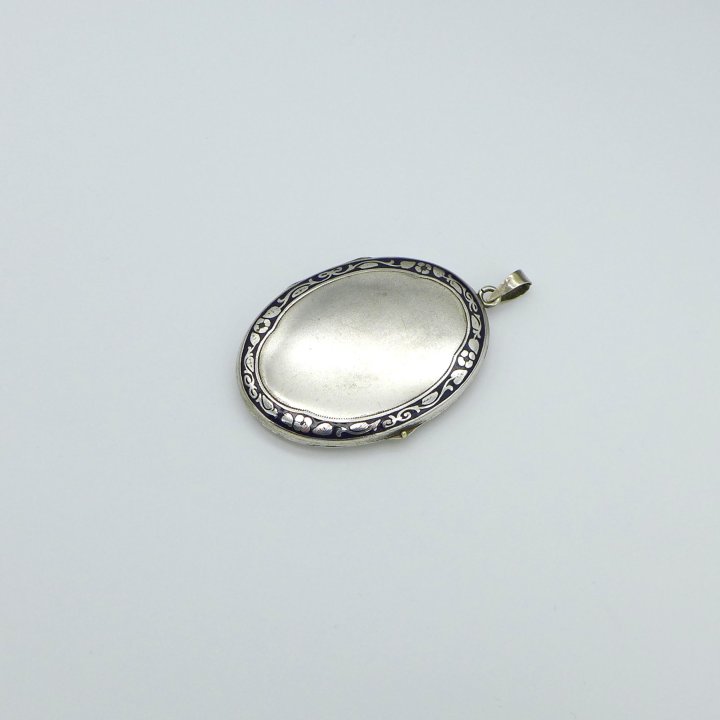 Large locket with floral black band