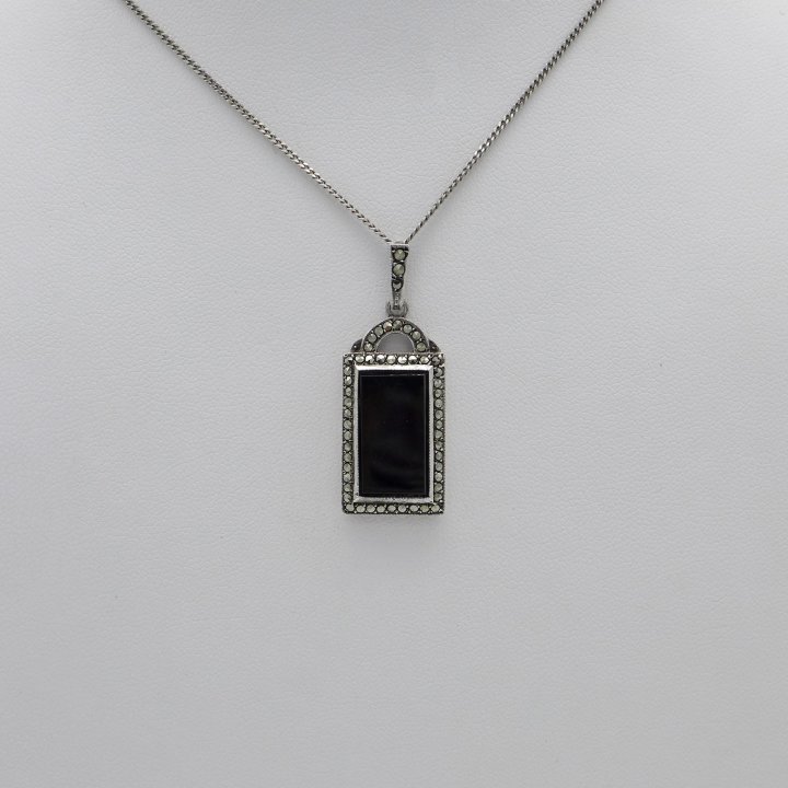 Rectangular Art Deco pendant with marcasite and onyx.