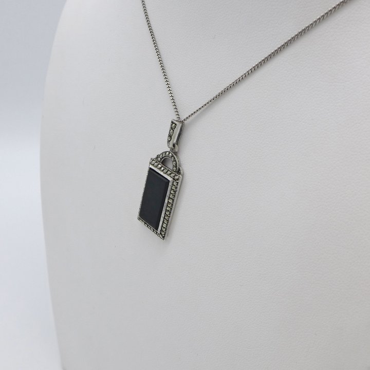 Rectangular Art Deco pendant with marcasite and onyx.