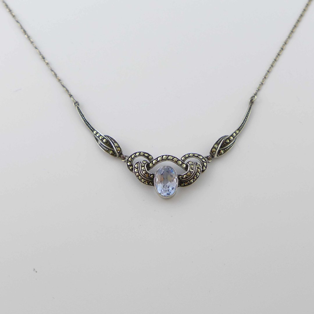 Markasite necklace with light blue stone