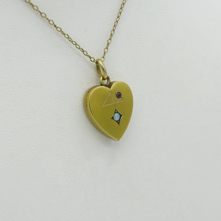 Gold heart with opal