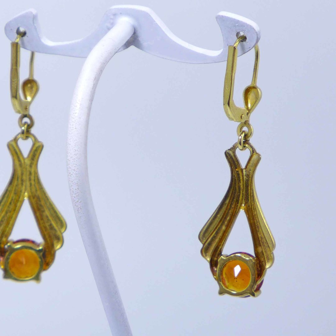 Gold earrings with topazes in cognac brown