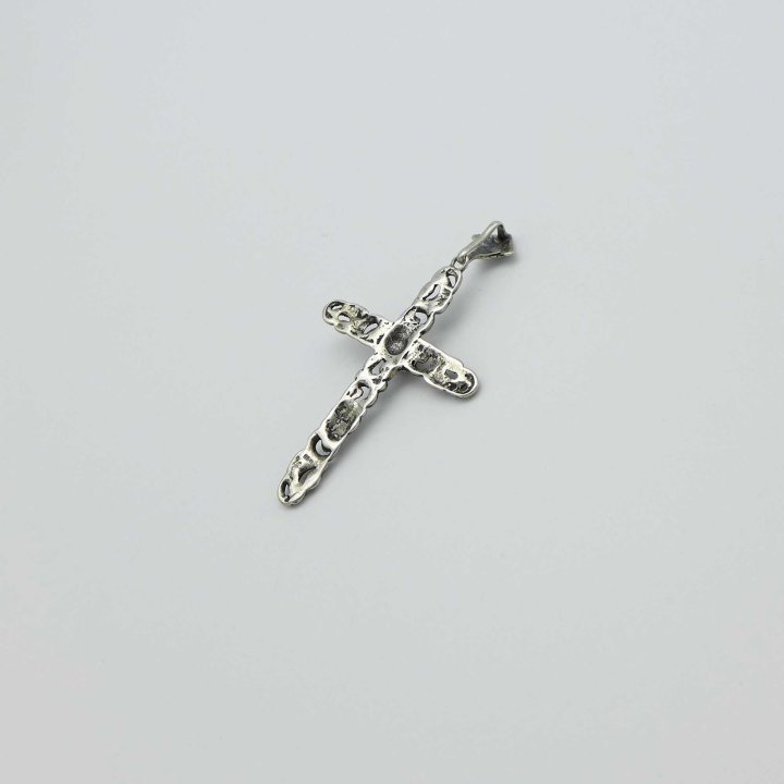 Silver cross with coral