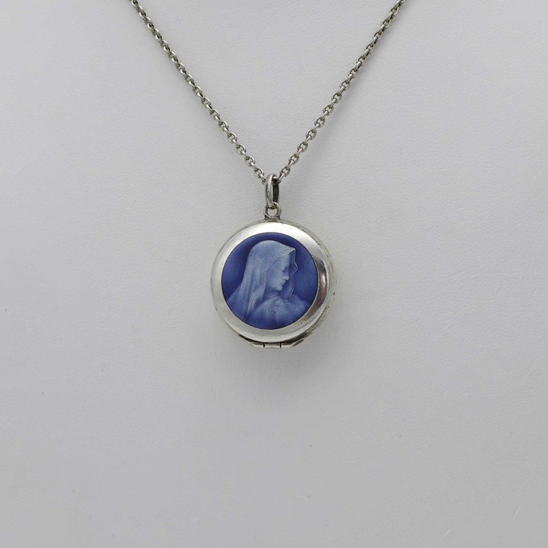 Enamelled silver medallion with Madonna
