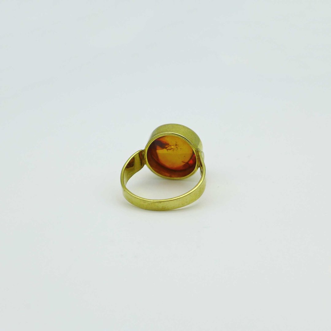 Gold-plated ring with round amber cabochon