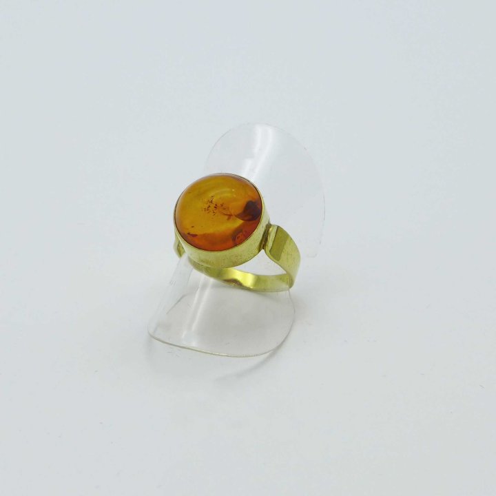 Gold-plated ring with round amber cabochon