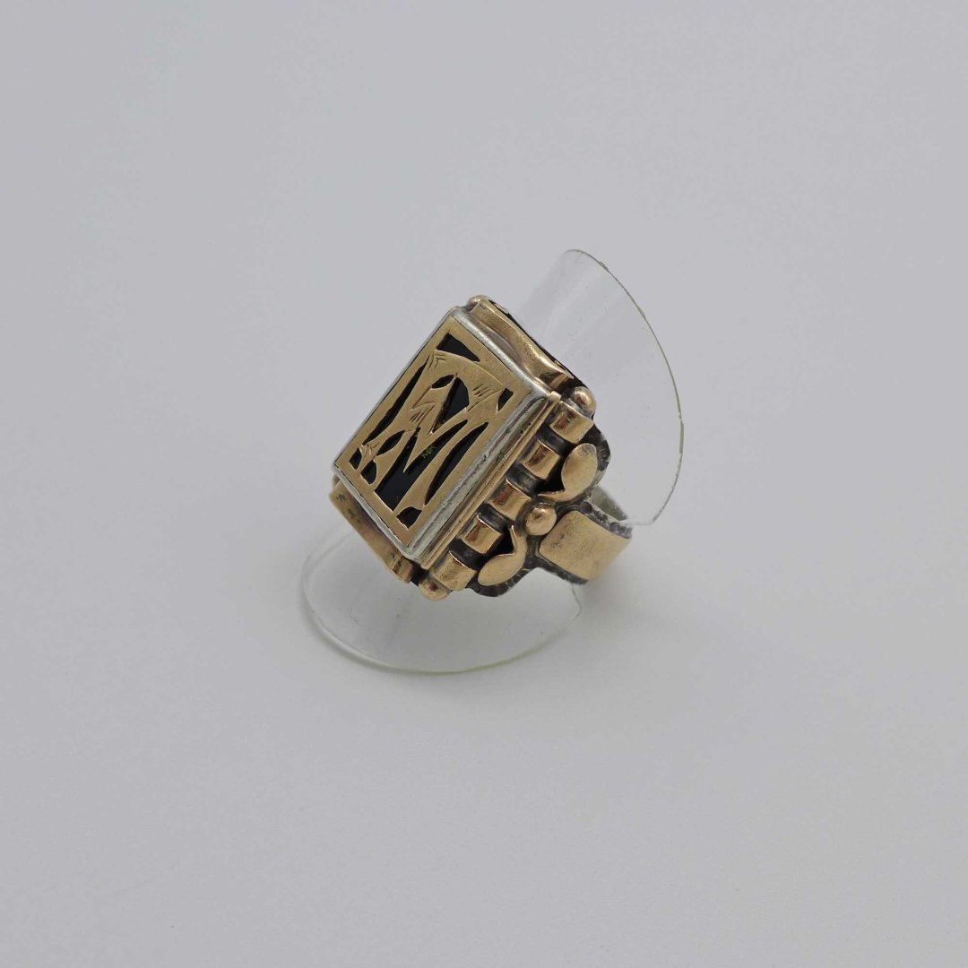 Gold and silver ring with monogram FM